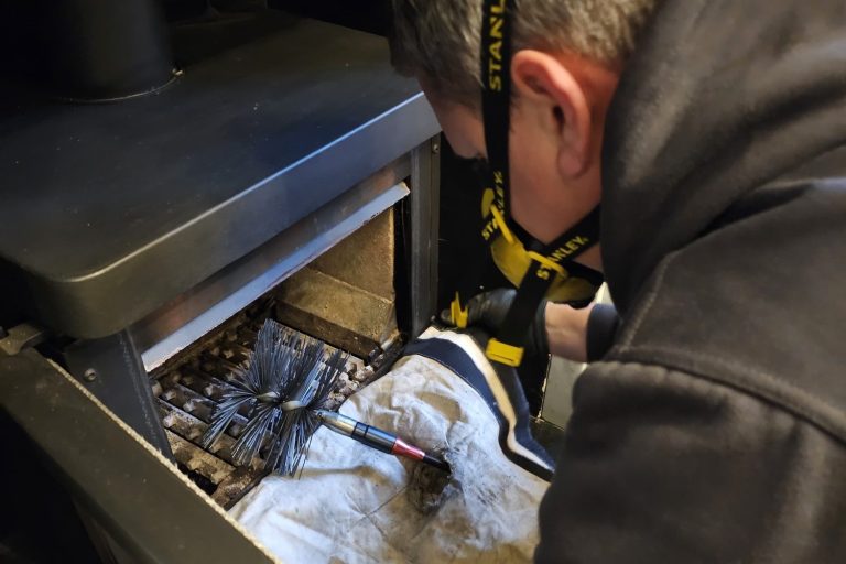 Swept. huddersfield chimney sweep Man sweeping chimney